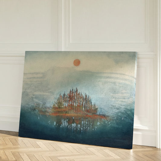 A framed art print featuring a serene lake scene with trees and a sunset, leaning against a wall.
